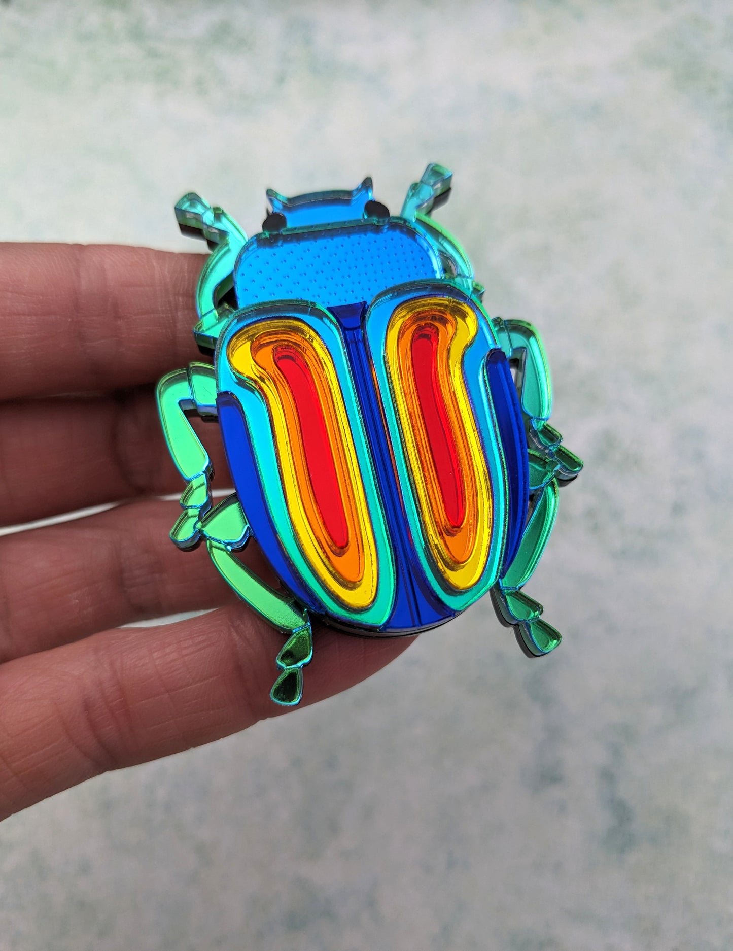 PRE ORDER Rainbow Beetle Brooch (Chrysolina Fatuosa) Just lighter green colouring on body left now so will look like the one on the white background and pendant (see listing)