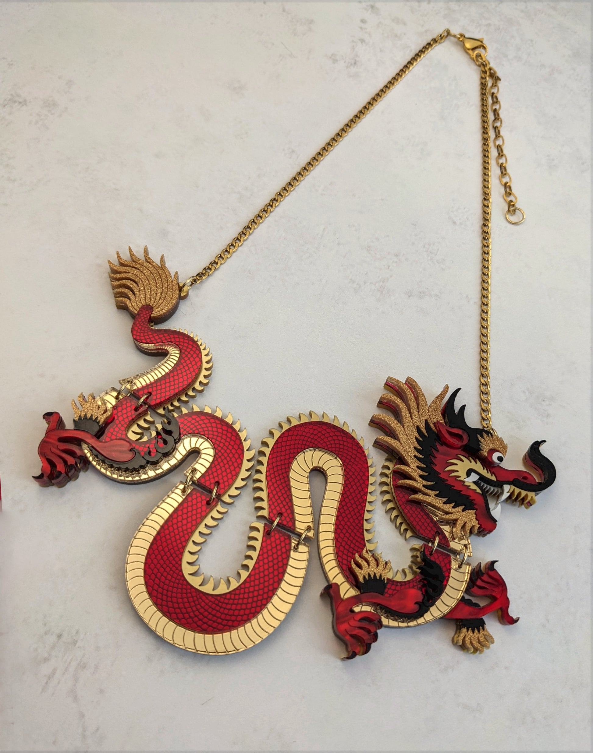 Handmade laser cut articulated acrylic red dragon necklace 