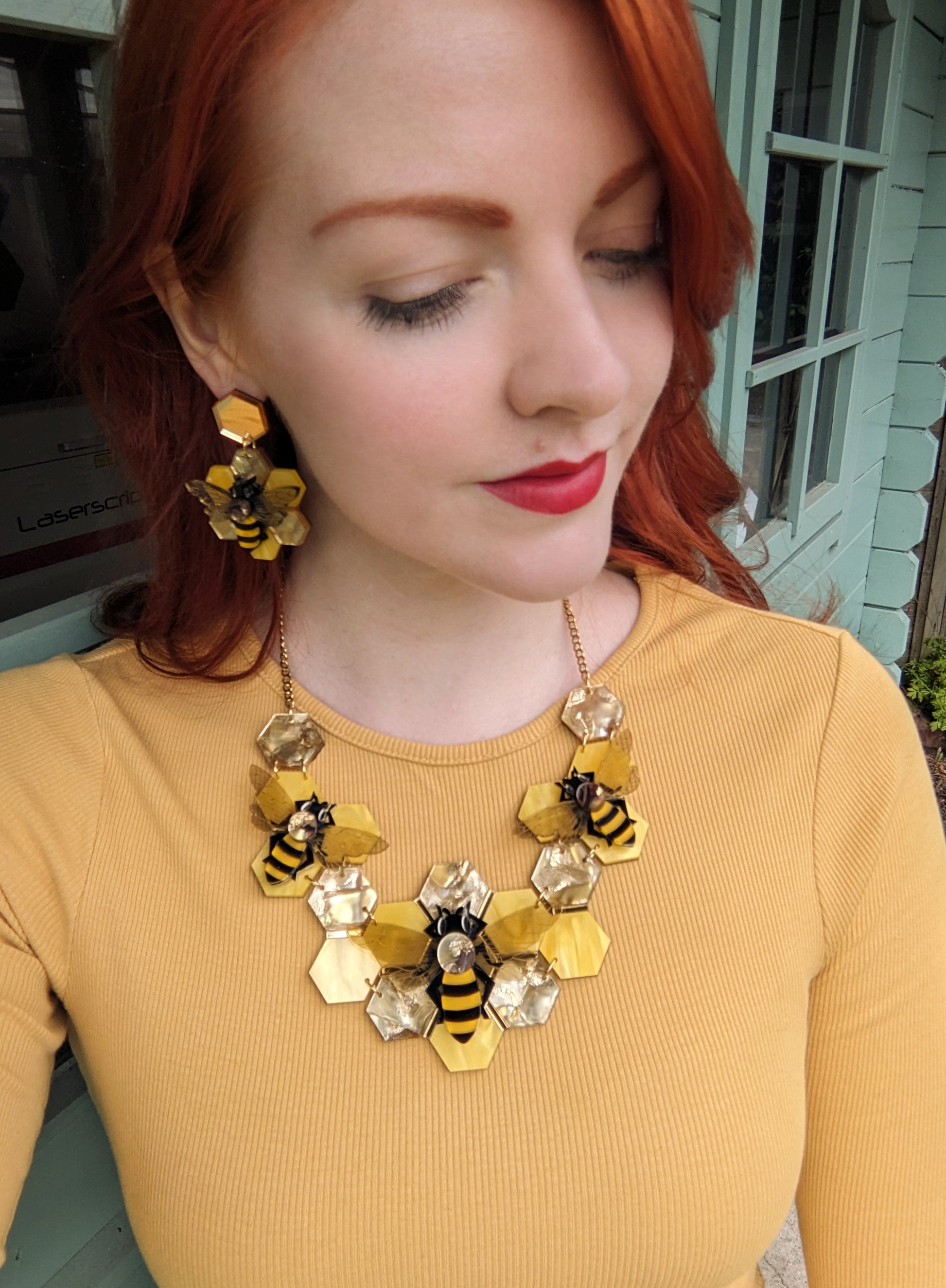 Handmade laser cut honey bee acrylic necklace featuring recycled 