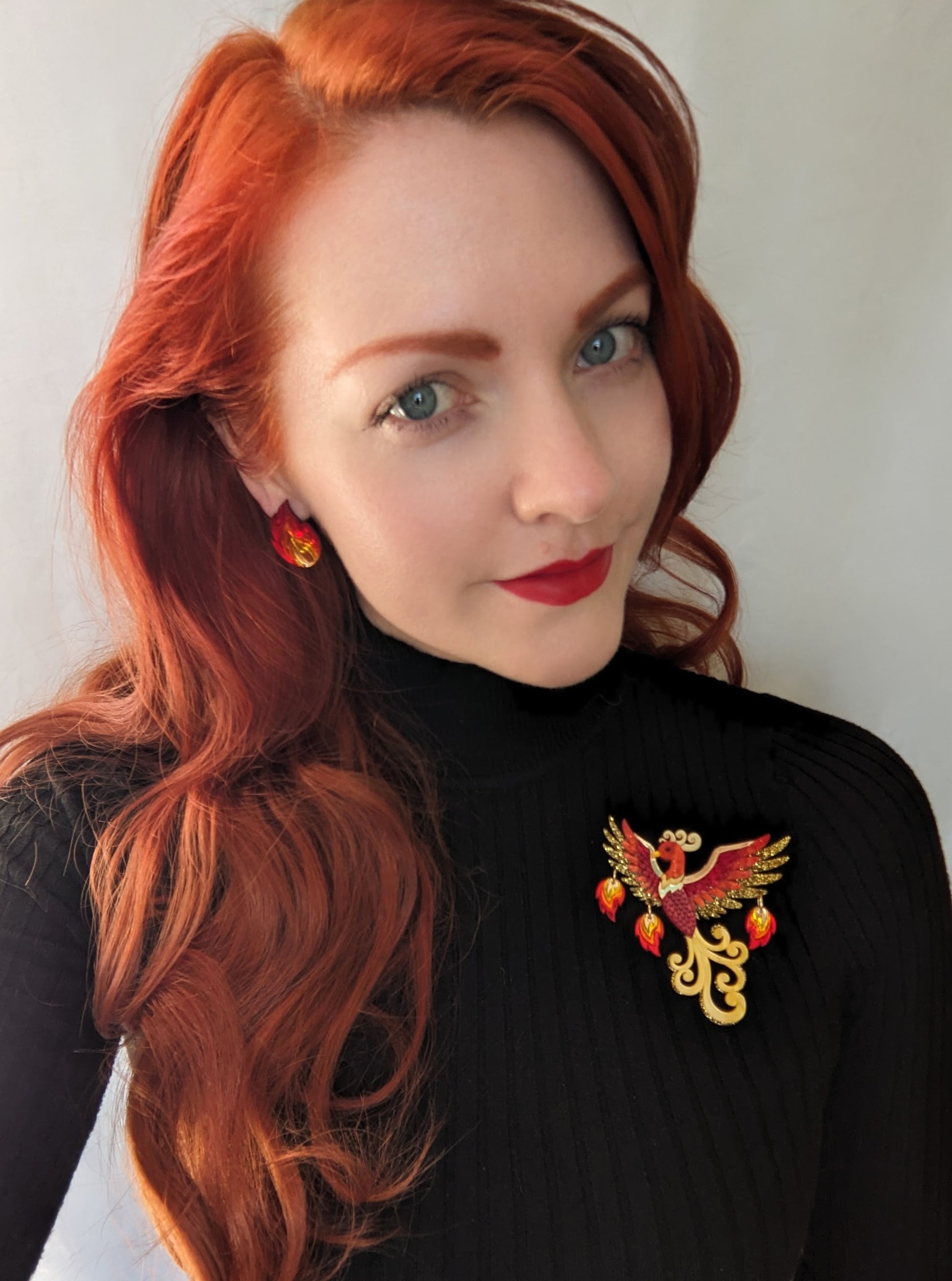Handmade laser cut acrylic phoenix brooch with flames by rock the panda