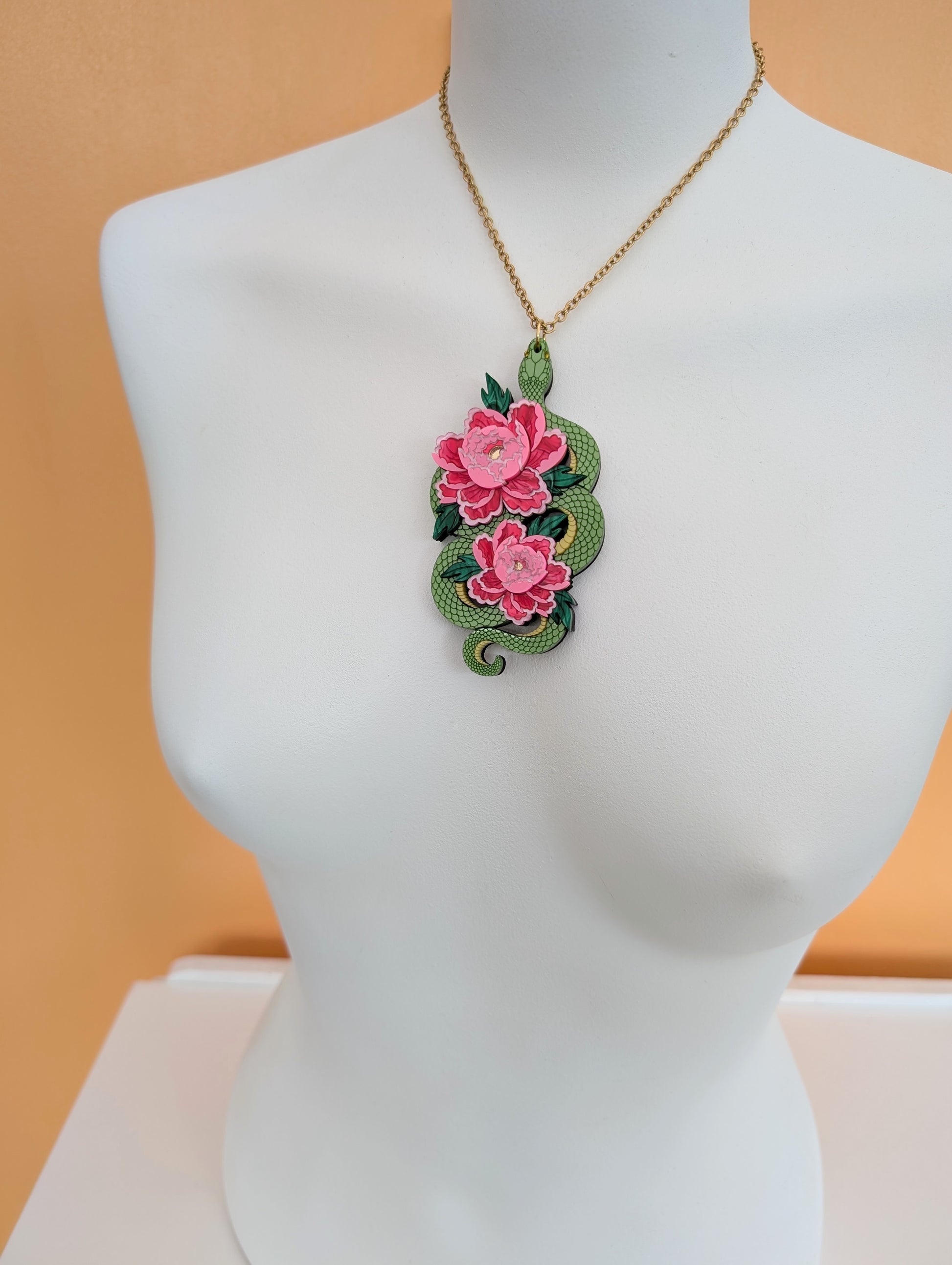 Acrylic laser cut snake necklace with peony flowers