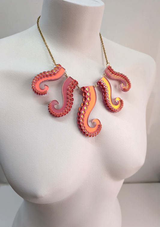 Laser cut acrylic octopus tentacle necklace in iridescent coral