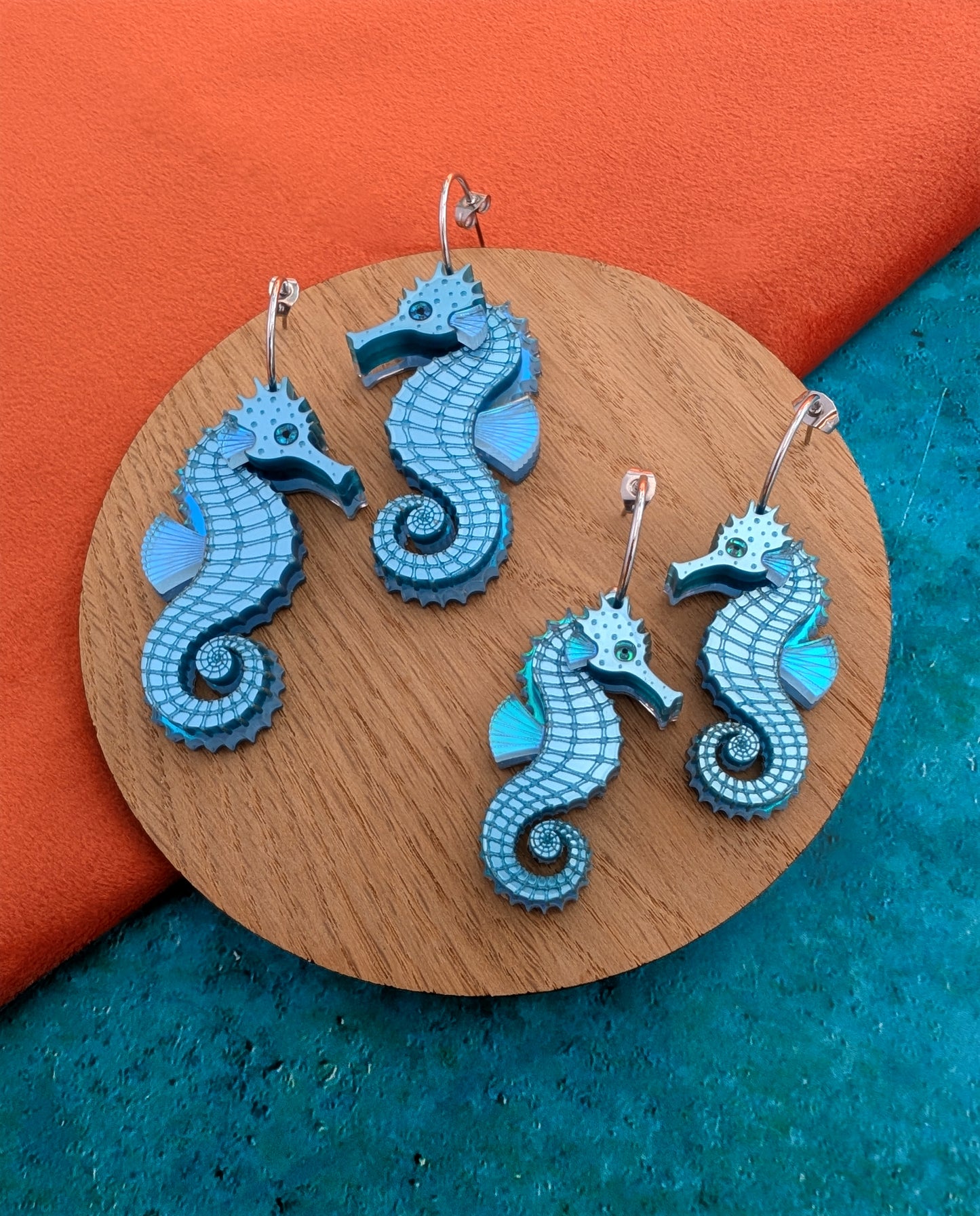 laser cut handmade acrylic blue seahorse earrings