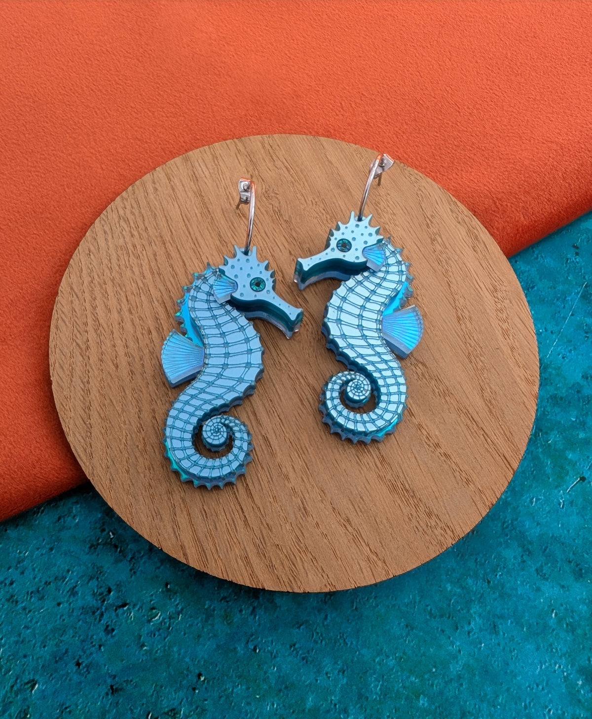 laser cut handmade acrylic blue seahorse earrings