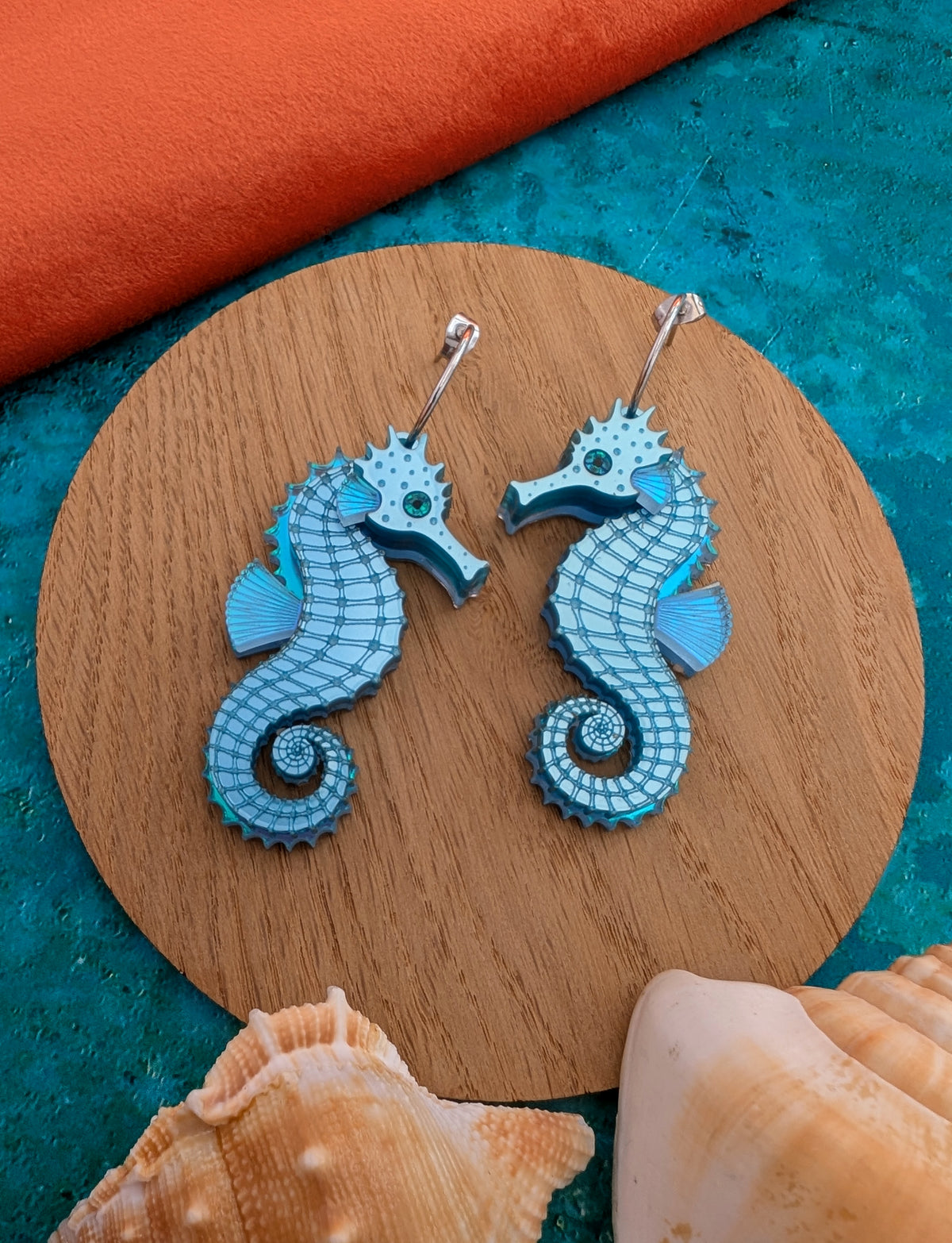 laser cut handmade acrylic blue seahorse earrings